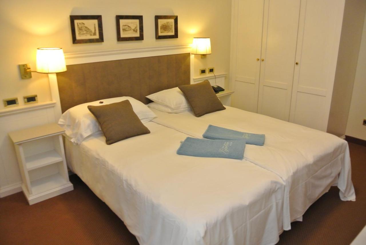 Hotel Garden Bagian luar foto