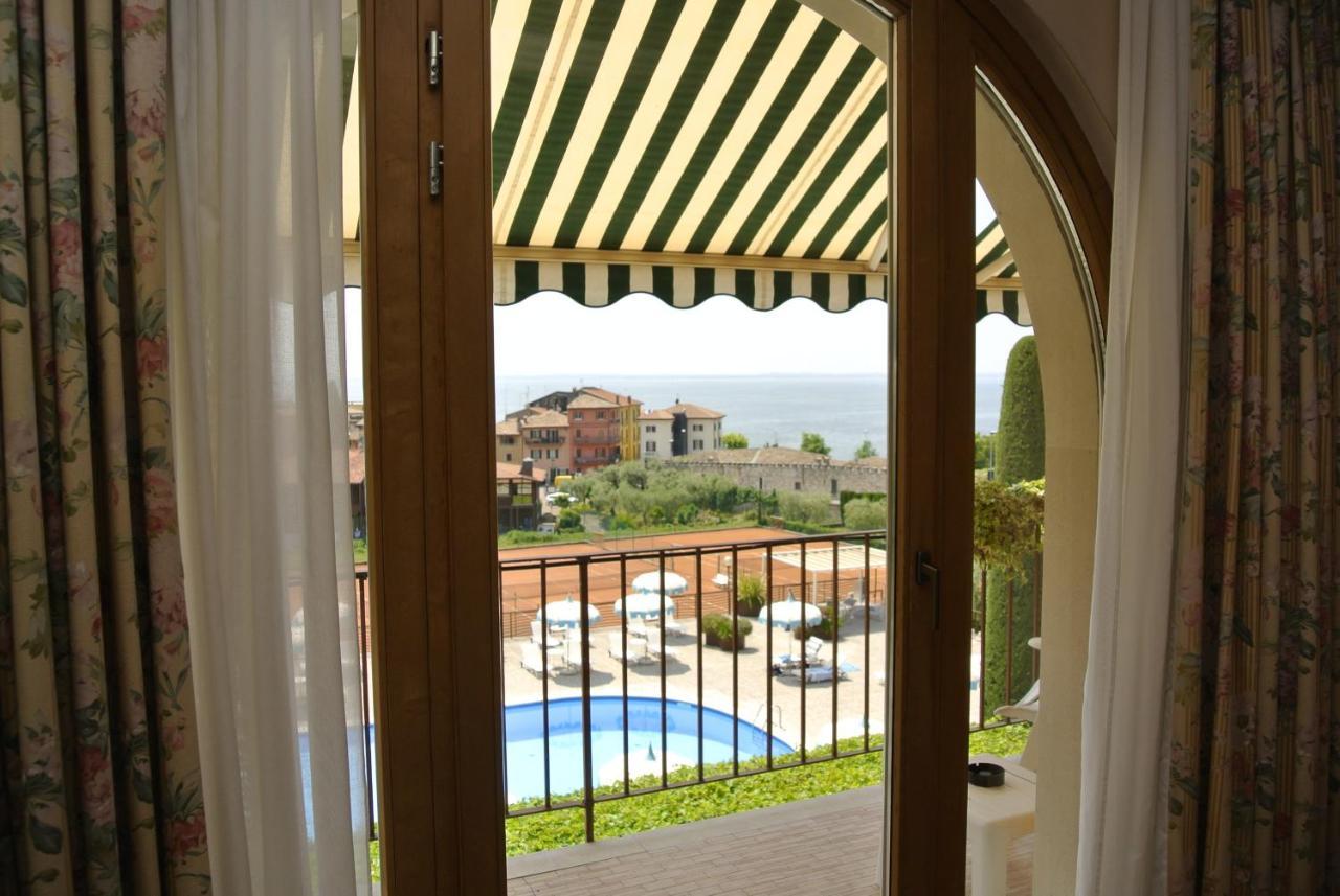 Hotel Garden Bagian luar foto