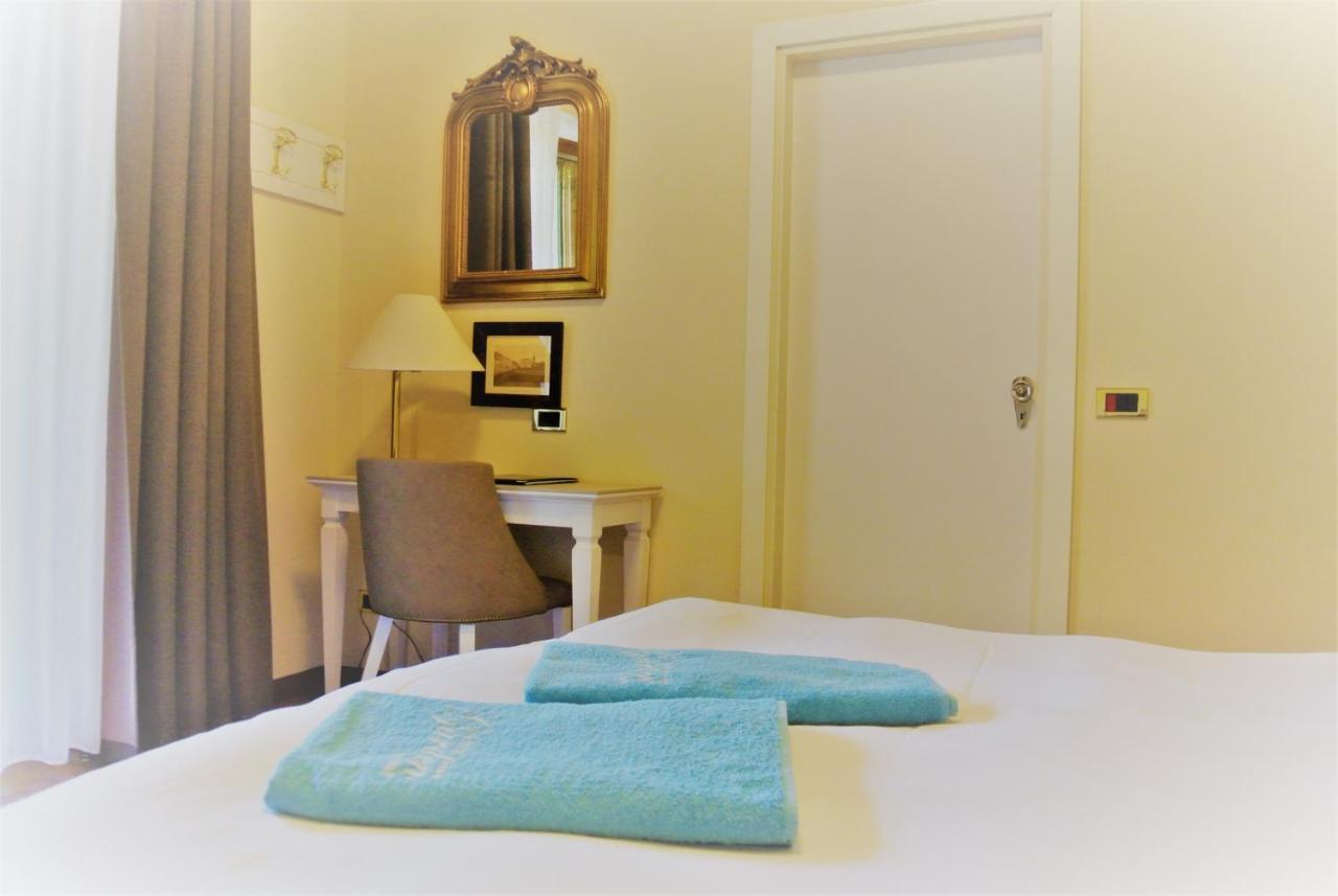 Hotel Garden Bagian luar foto